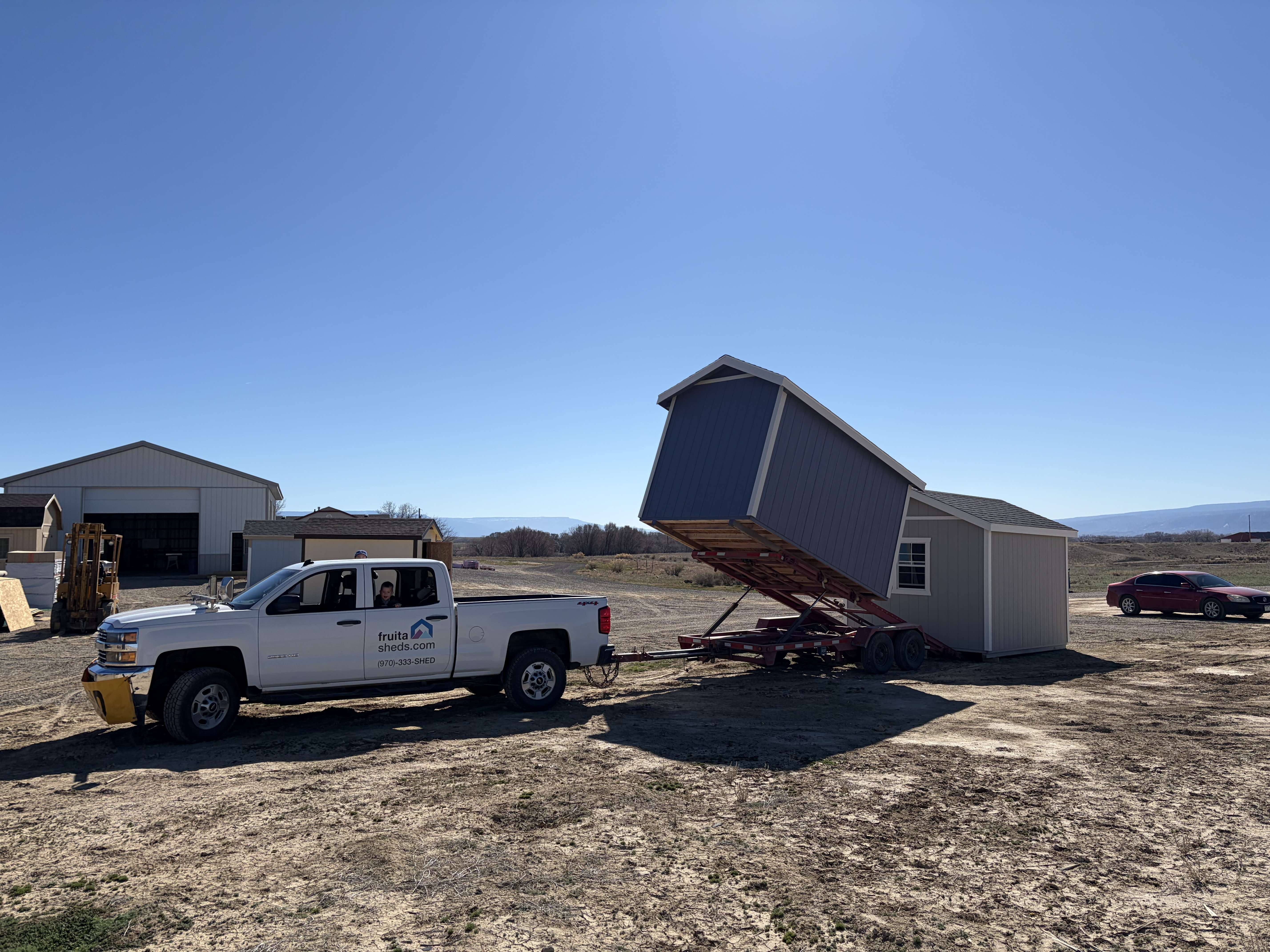 Fruita Sheds Loading A Shed For Delivery